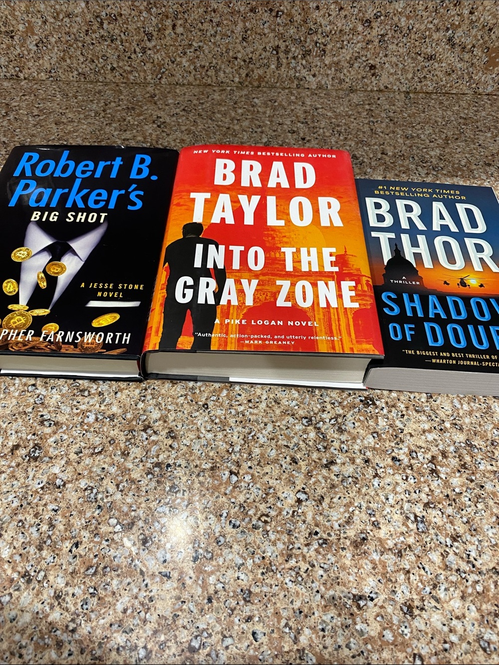 Three brand new books. Authors:
Robert Parker, Brad Taylor and Brad Thor